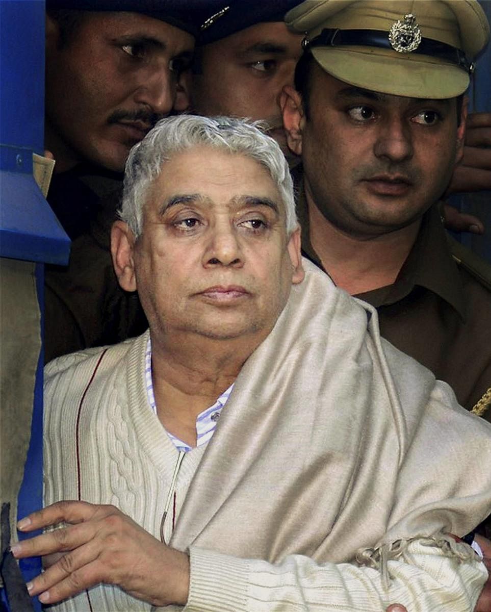 A Haryana court sentenced self-styled godman Rampal and his 13 followers to life imprisonment in a second case of murder on Wednesday. PTI Photo
