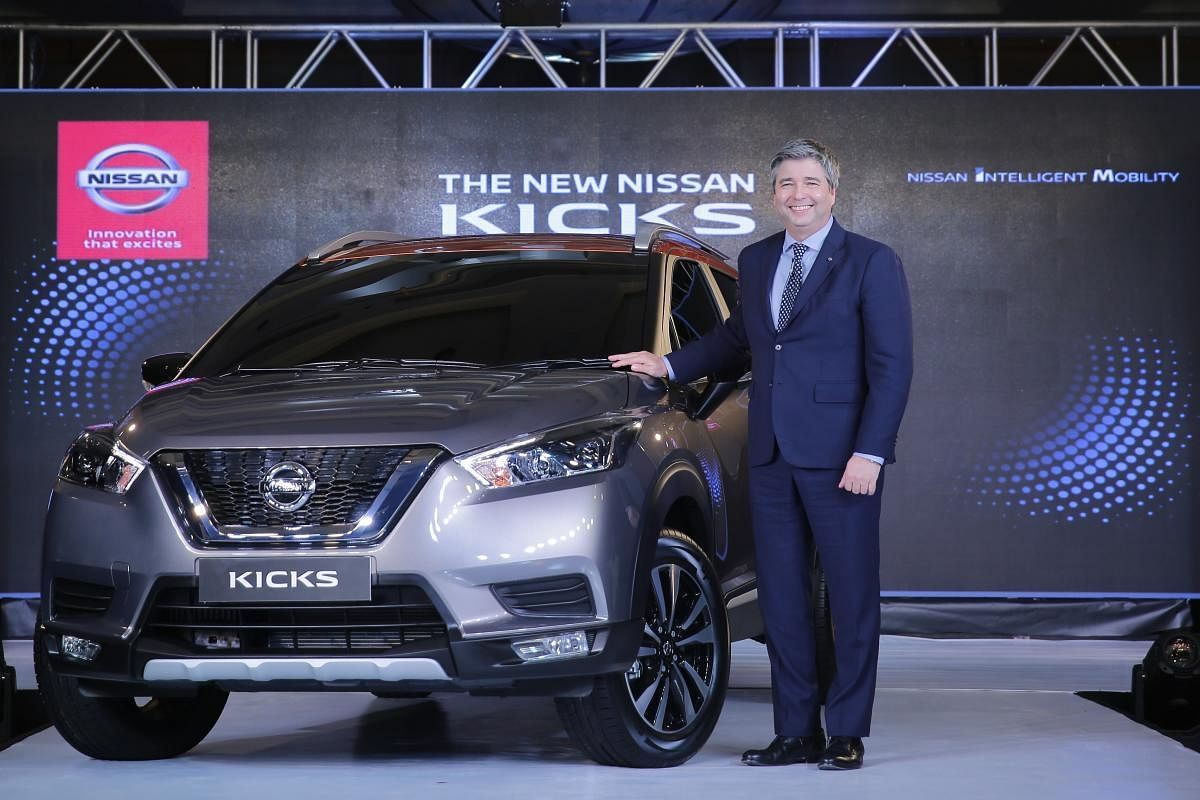 Thomas Kuehl, president, Nissan India Operations unveils Nissan Kicks, a luxury SUV, in Mumbai.