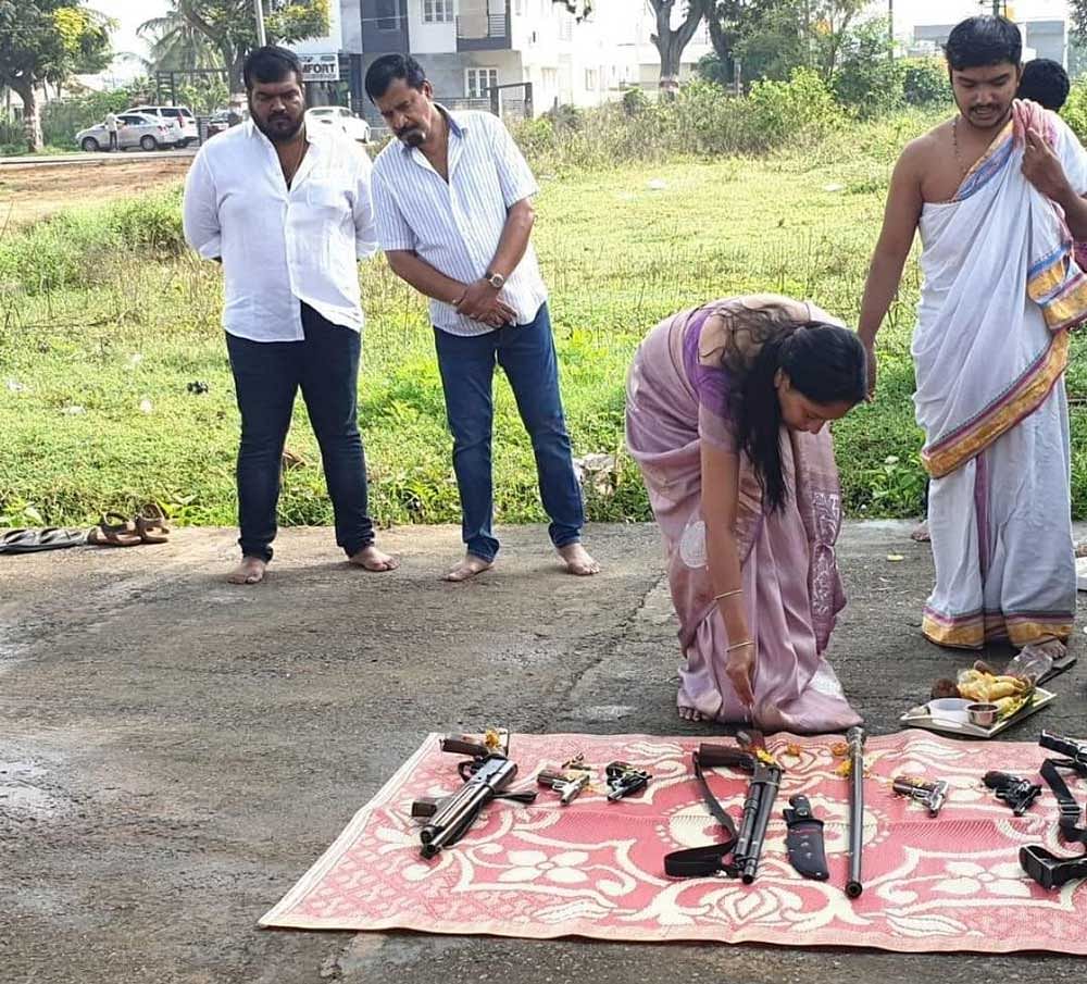 N Muthappa Rai, the flamboyant gangster-turned-Kannada activist, sought to intimidate his rivals with a display of lethal weapons during an Ayudha Puja event but instead attracted police attention.  DH Photo