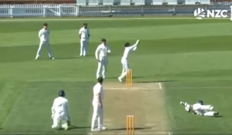 Otago batsmen Michael Rippon (left) and Nathan Smith both are on the ground as Wellington's wicket-keeper readies to take off the bails. (YouTube video grab)