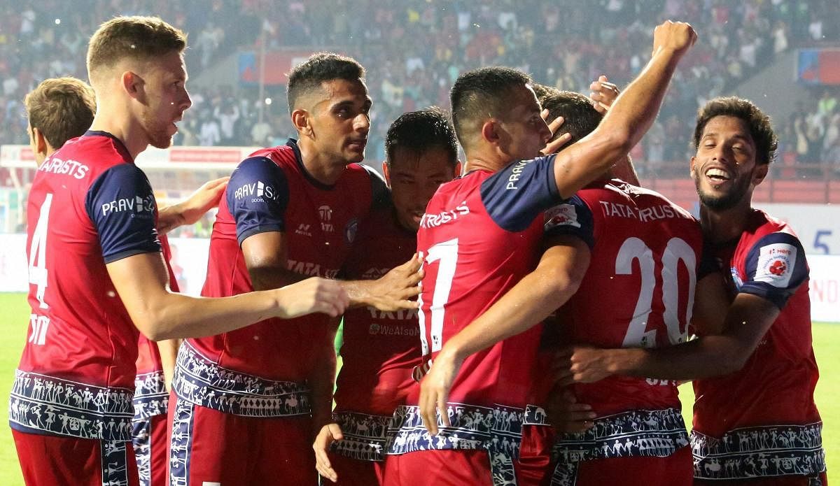 Jamshedpur FC players celebrate after taking the lead against ATK. PTI