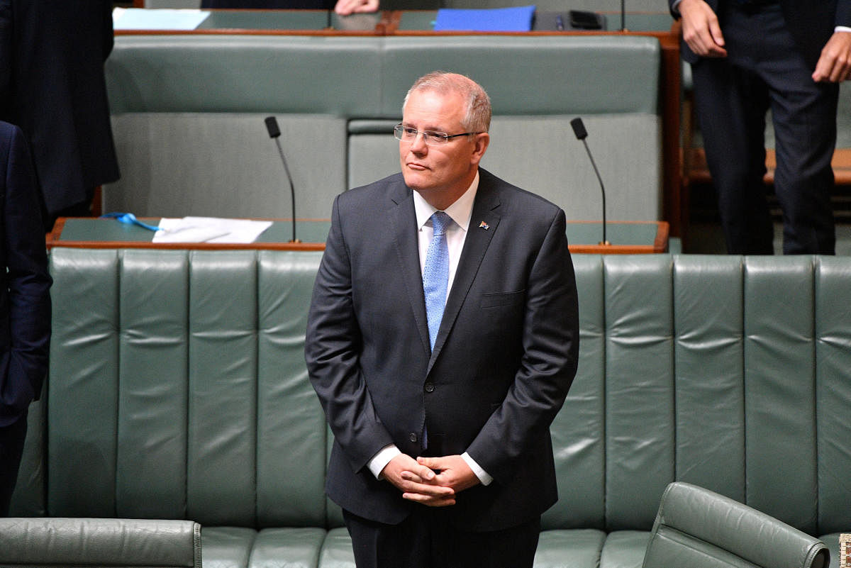 Australia's Prime Minister Scott Morrison stands before delivering the National Apology to survivors of child sexual abuse in the House of Representatives at Parliament House in Canberra, Australia, October 22, 2018. (AAP/Mick Tsikas/via REUTERS)