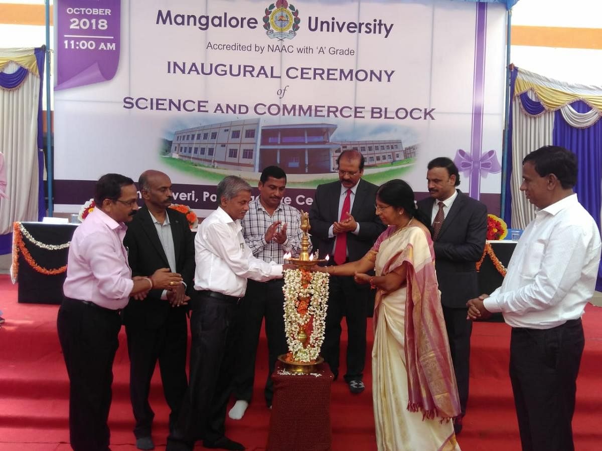  Director Dr V Sivaprasad inaugurates the new buildings of Science and Commerce blocks at Mangalore University PG centre in Chikkaluvara on Monday. 