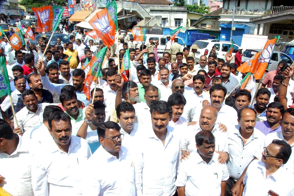BJP leaders and workers stage a protest at Azad Park Circle in Chikkamagaluru.