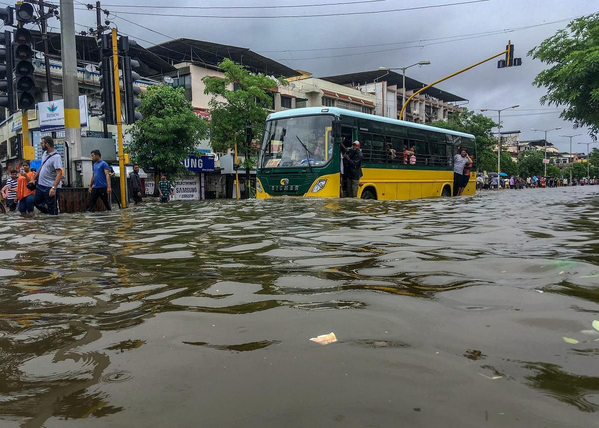 Vasai: A flooded street following heavy rains, in Vasai, Maharashtra on Tuesday, 10 July, 2018. (PTI Photo)(PTI7_10_2018_000186B)