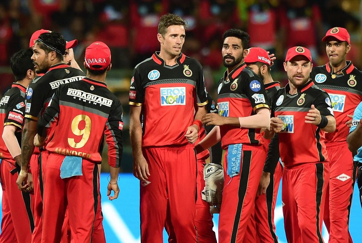 Royal Challengers Bangalore's Tim Southee (centre) was the pick of their bowlers against Mumbai Indians on Tuesday. PTI