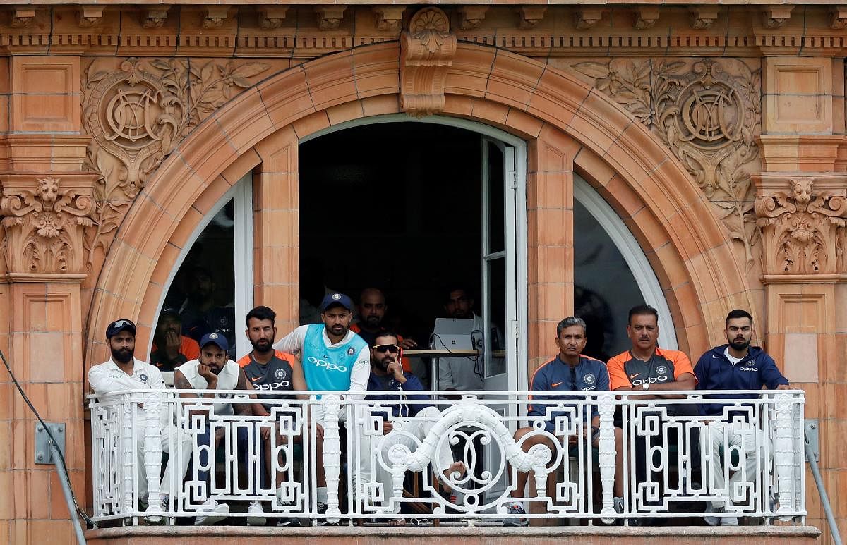 The glum faces of Indian players and team's support staff provide perfect background for their gloomy situation in England at the moment. AFP