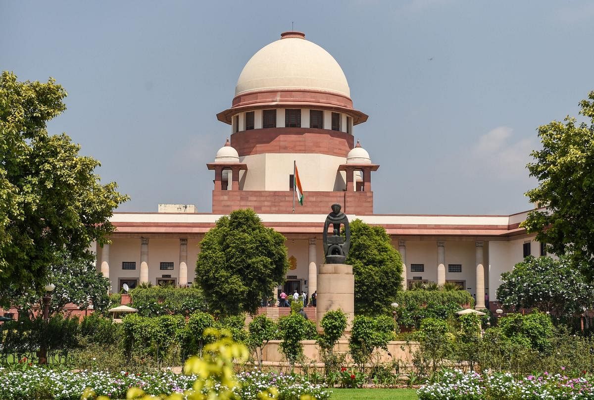 An outside view of the Supreme Court, in New Delhi, on Wednesday. The Supreme Court declared the Centre's flagship Aadhaar scheme as constitutionally valid but struck down some of its provisions including its linking with bank accounts, mobile phones and