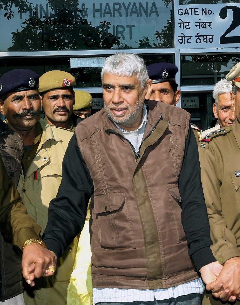 Self-proclaimed godman Rampal and 26 of his followers were charged with murder and wrongful confinement after four women and a child were found dead in his Satlok Ashram in Barwala town in Hisar. (PTI File photo)