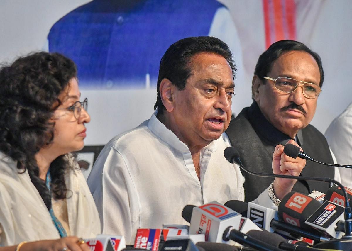 Madhya Pradesh Congress Committee President Kamal Nath addresses a press conference at state party headquarters in Bhopal on Tuesday. PTI