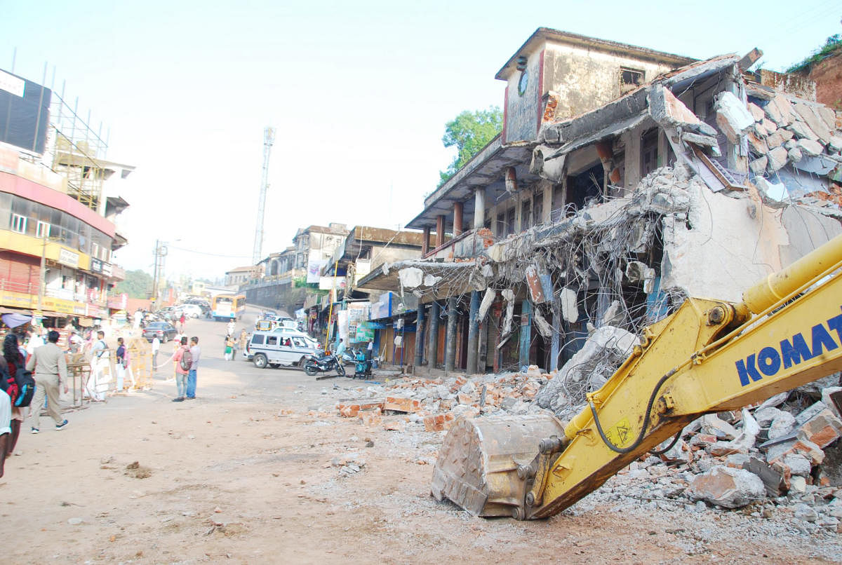 The old private bus stand of Madikeri being demolished.