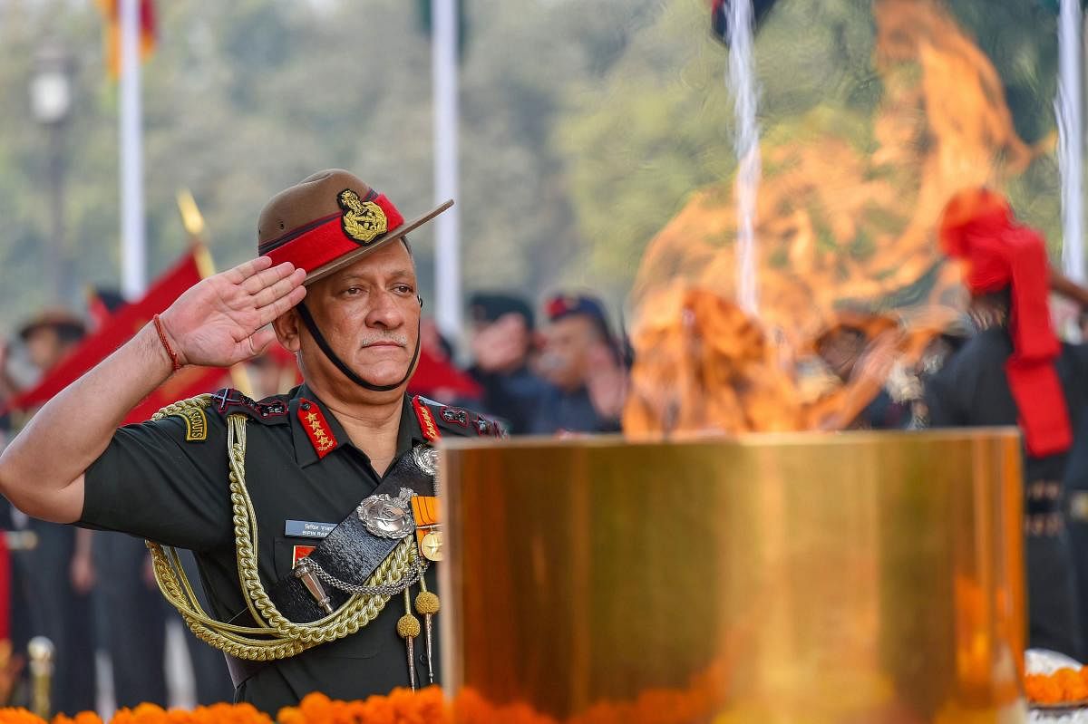 Chief of Army Staff, General Bipin Rawat pays homage to the Martyrs, on the occasion of Infantry Day, at the Amar Jawan Jyoti, India Gate in New Delhi Saturday, Oct 27, 2018. PTI Photo