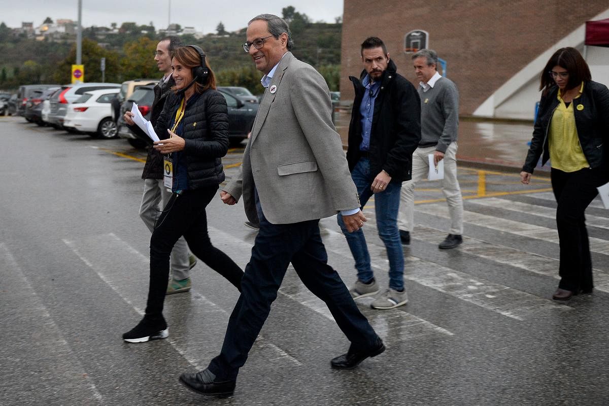 Catalan regional president Quim Torra (C) arrives to attend the founding convention of the new Catalan separatist party 'Crida Nacional' (National Call) in Manresa. AFP