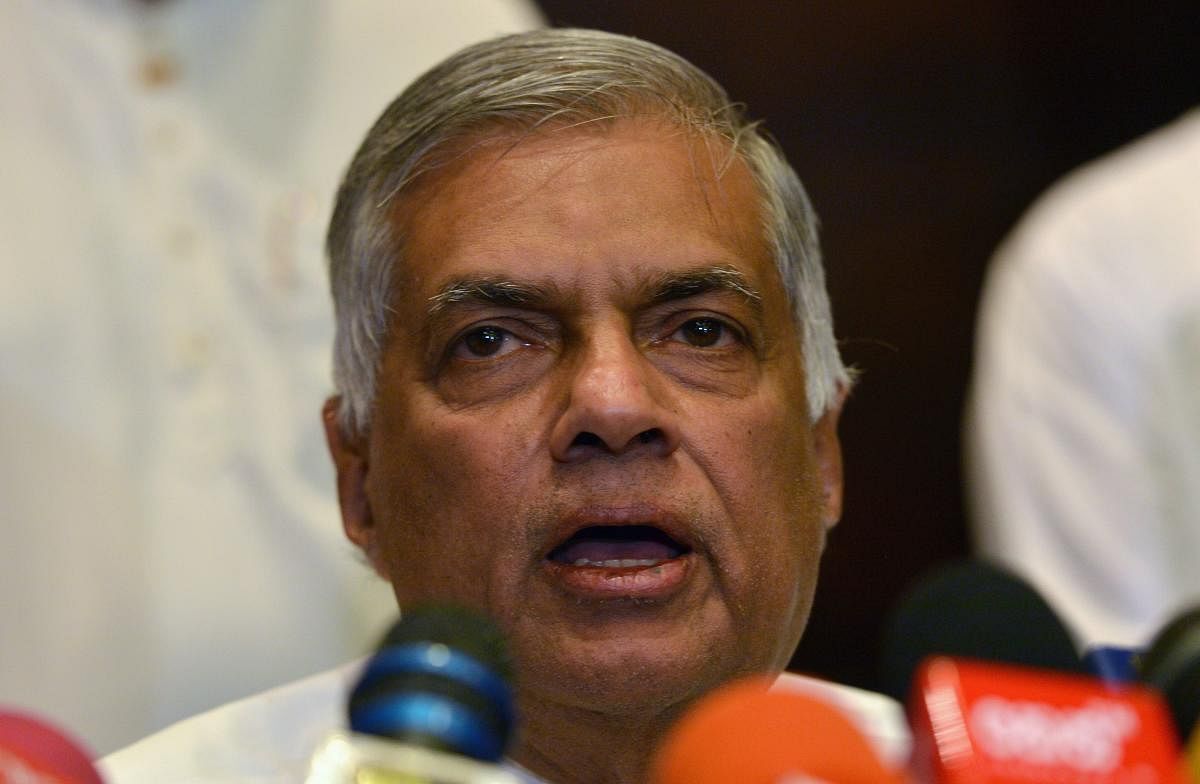 Sri Lanka's ousted prime minister Ranil Wickremesinghe speaks during a media conference in Colombo on October 27, 2018. - Sri Lanka President Maithripala Sirisena on October 27 suspended parliament, deepening political turmoil after he sacked the country'
