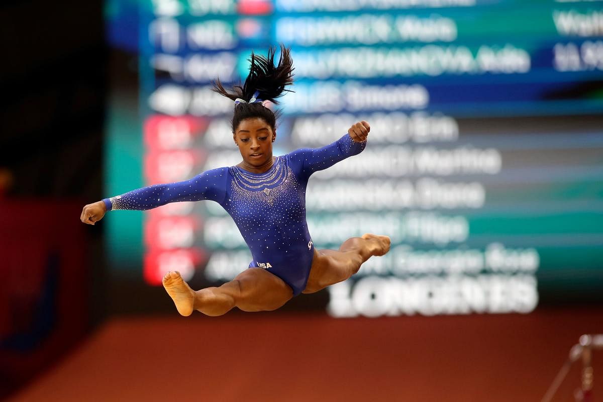 INSPIRING: Simone Biles of the US competes in the women's floor qualification of the Artistic Gymnastics Championship in Doha on Saturday. AFP