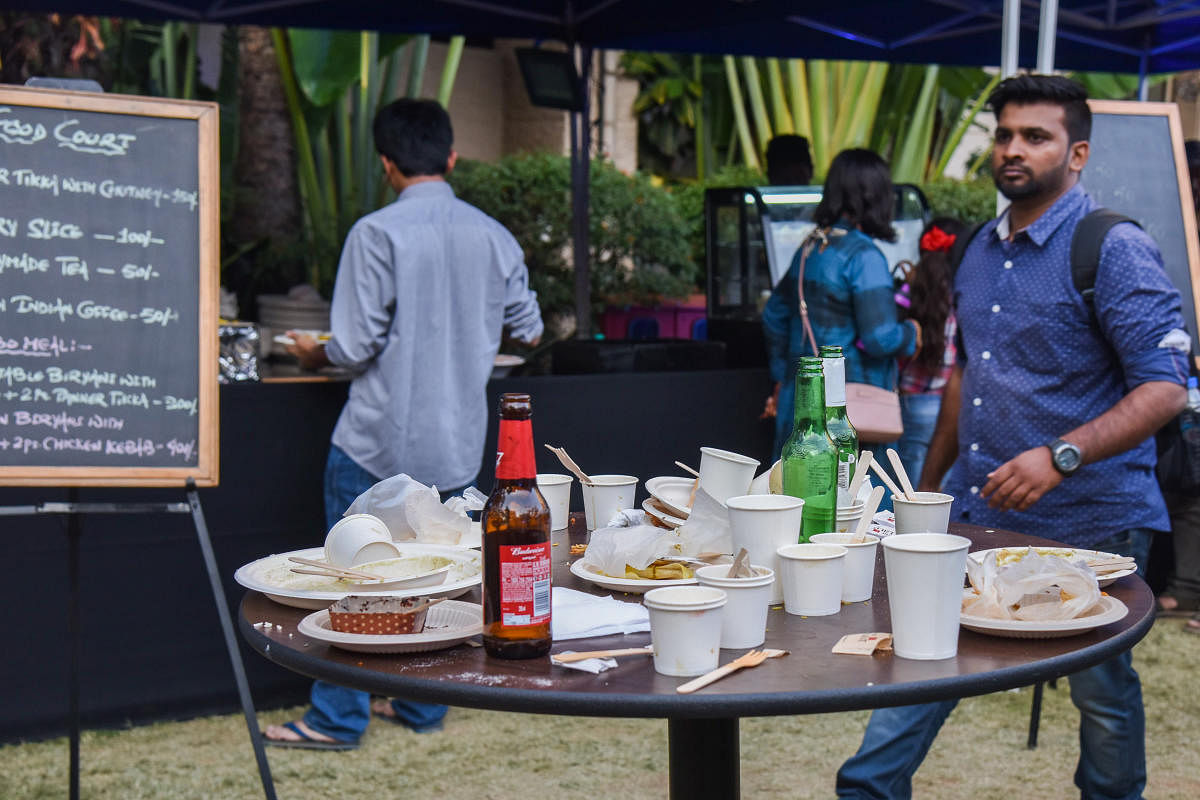 Waste seen on the tables at the festival. DH Photo/S K Dinesh
