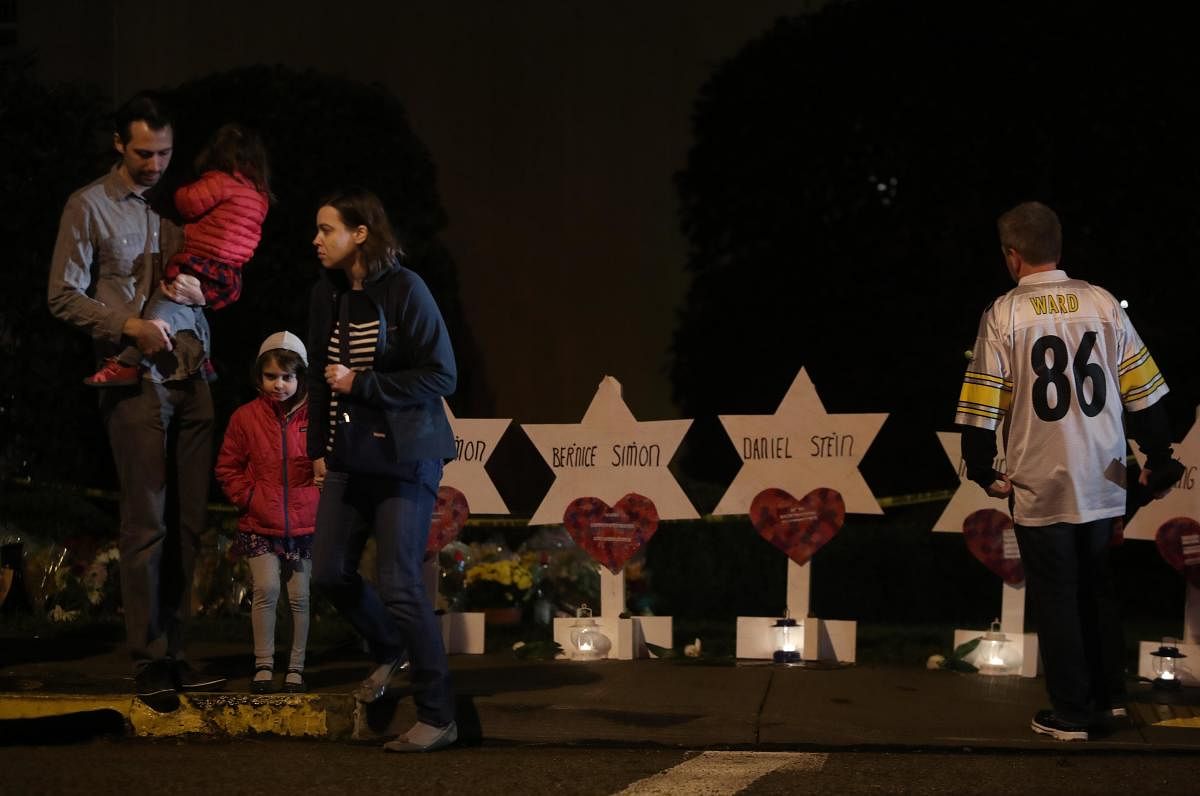 Mourners visit a makeshift memorial outside the Tree of Life synagogue, a day after 11 Jewish worshippers were shot dead in Pittsburgh, Pennsylvania, U.S., October 28, 2018. (Reuters Photo)