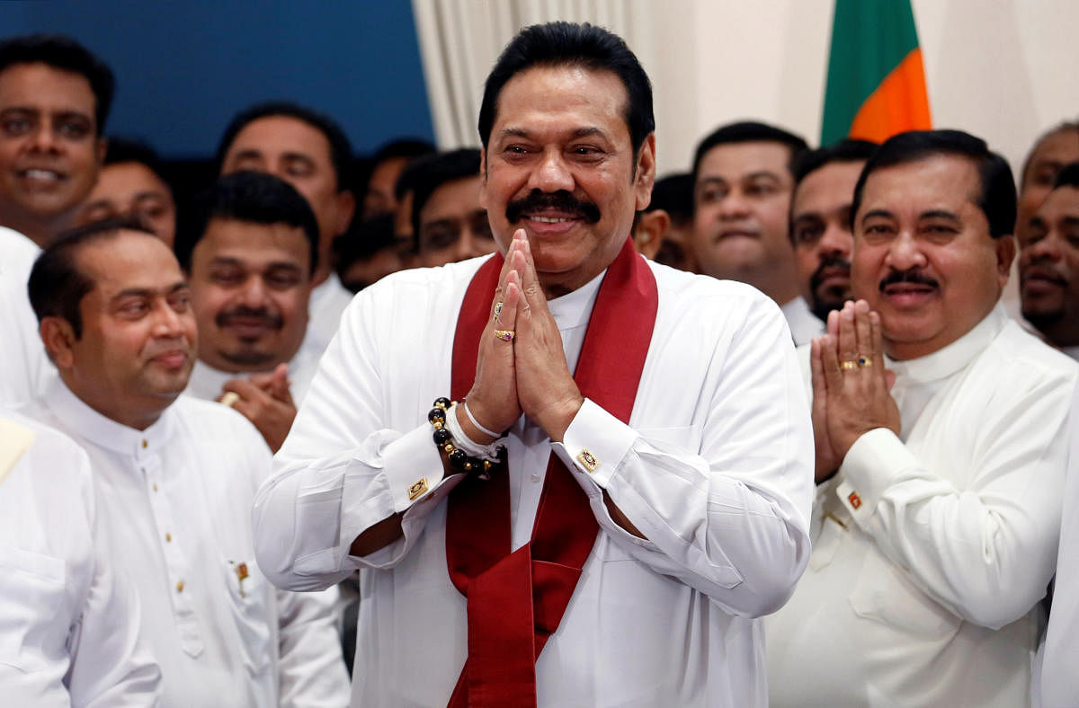 Sri Lanka's newly appointed Prime Minister Mahinda Rajapaksa gestures during the ceremony to assume duties at the Prime Minister office in Colombo, Sri Lanka October 29, 2018. (Reuters Photo)