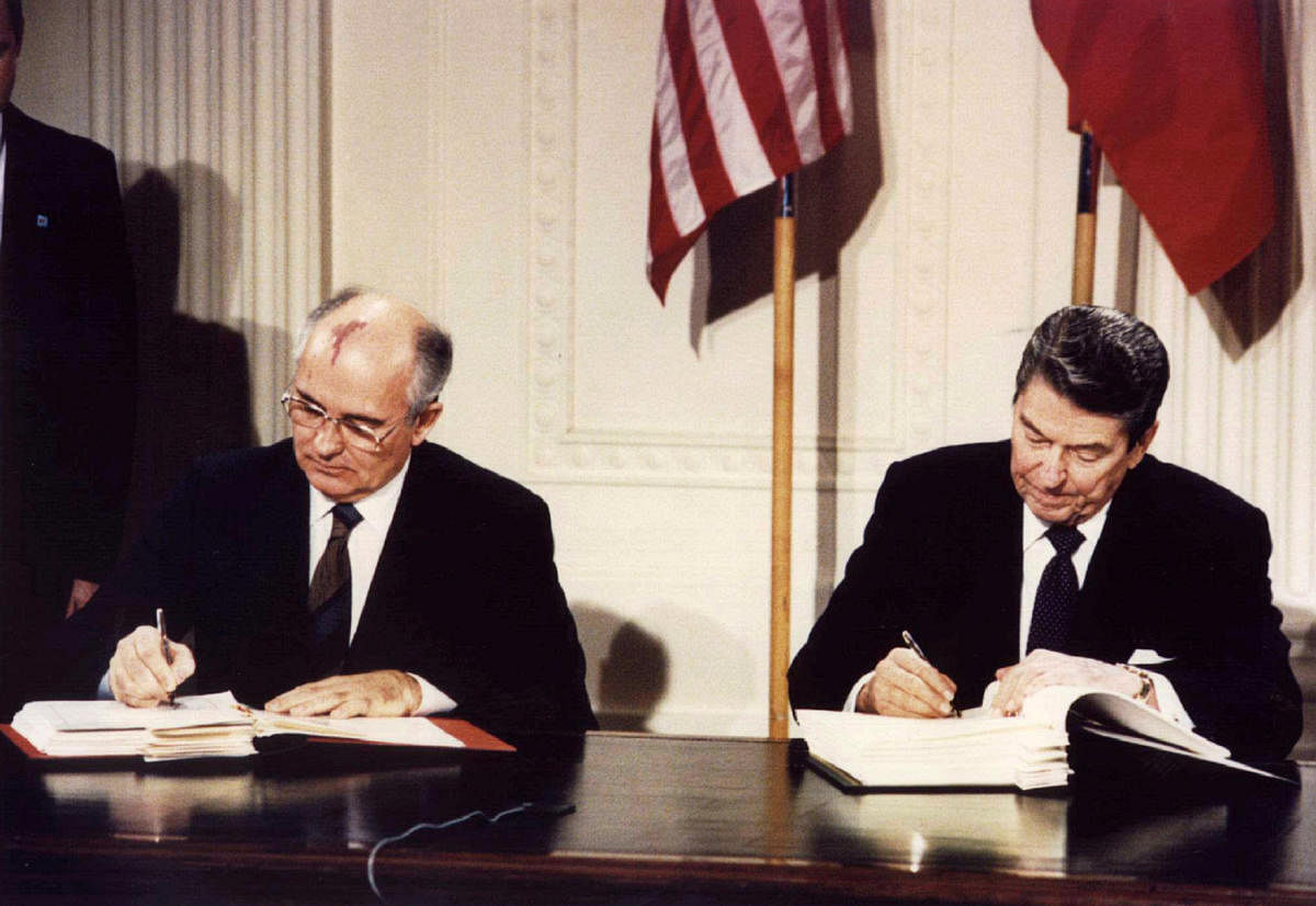 US President Ronald Reagan (R) and Soviet President Mikhail Gorbachev sign the Intermediate-Range Nuclear Forces (INF) treaty at the White House, Washington, on December 8 1987. REUTERS File Photo