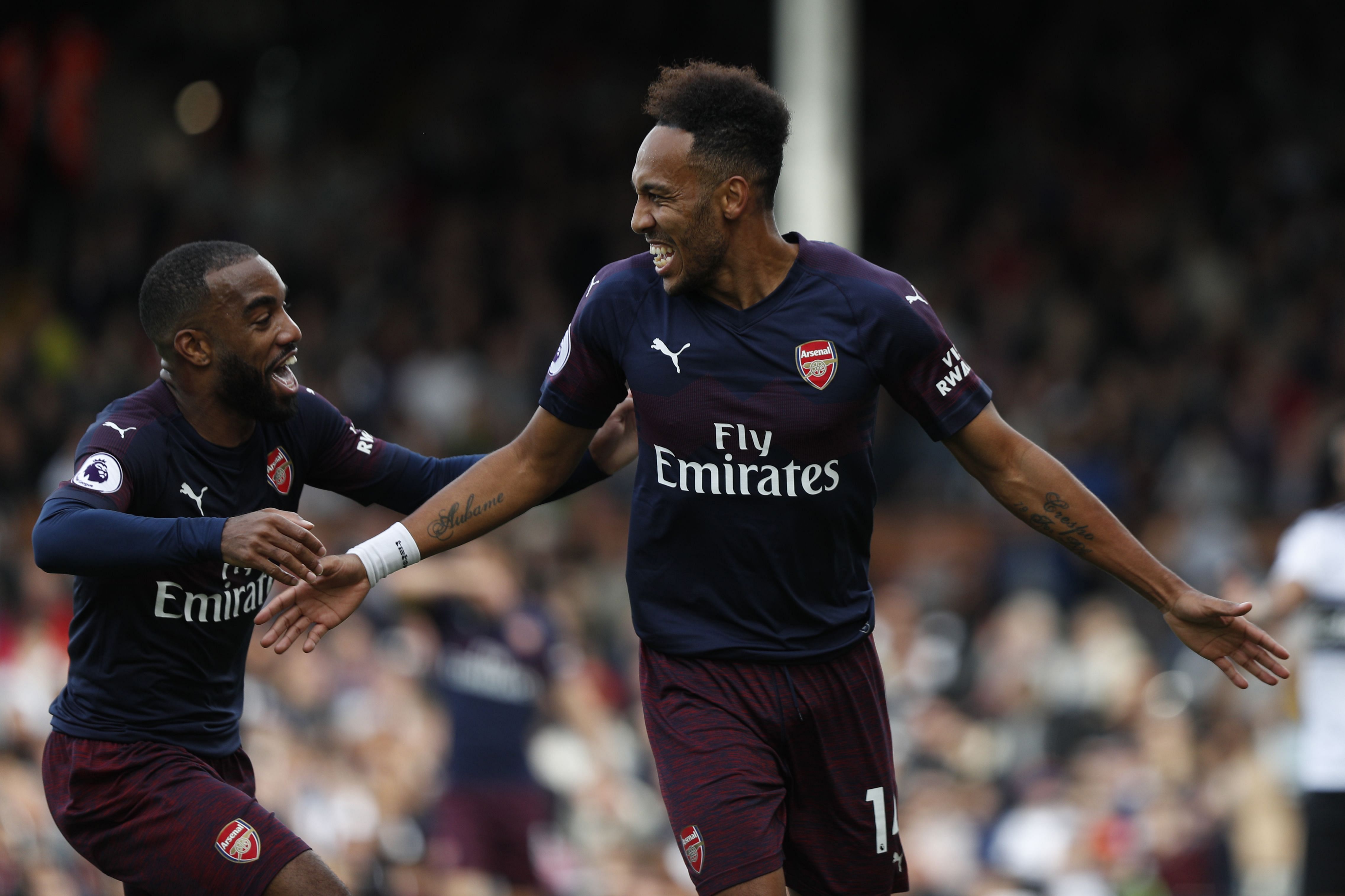 Arsenal's strike duo of Alexandre Lacazette (left) and Pierre-Emerick Aubameyang, who have combined for 14 goals this seasons, will need to be at their best against Liverpool on Saturday. AFP