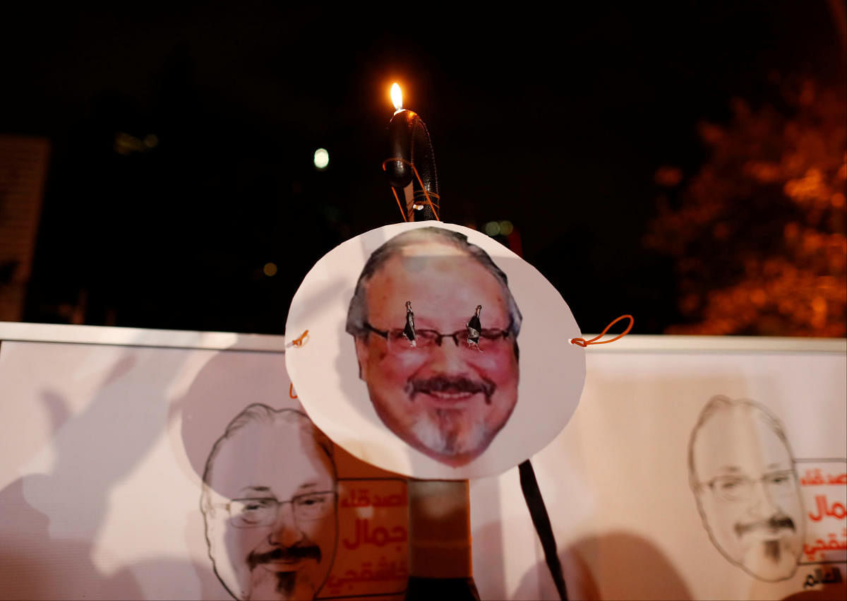 Demonstrators hold placards with a picture of Saudi journalist Jamal Khashoggi outside the Saudi Arabia consulate in Istanbul, Turkey October 25, 2018. (Reuters File Photo)