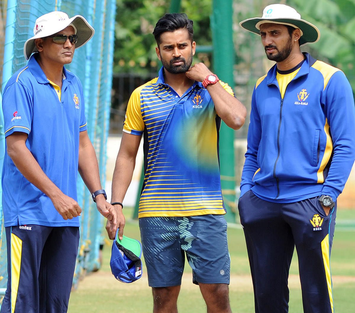 LOTS OF THINKING TO DO: Karnataka captain R Vinay Kumar (centre) and coach and assistant coach duo of Yere Goud (left) and S Arvind know their task this season is going to be a difficult one. DH Photo/ Srikanta Sharma R 