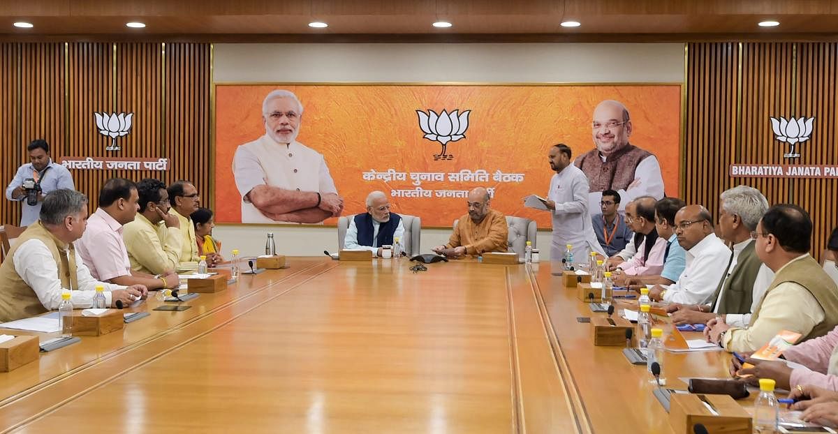 Prime Minister Narendra Modi, BJP President Amit Shah and other leaders during the party's Central Election Committee meeting at party headquarters in New Delhi. (PTI Photo)
