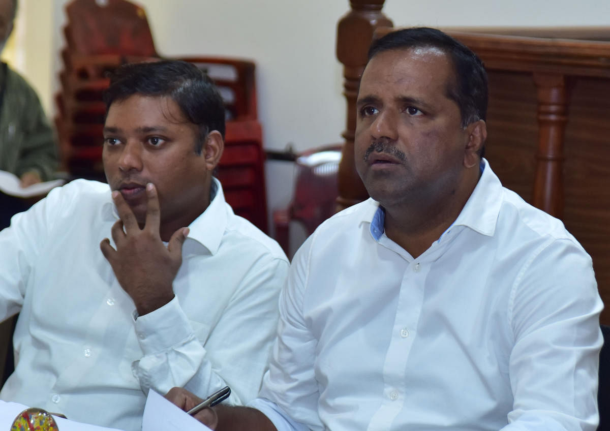 District In-charge Minister U T Khader at meeting at the DC Office in Mangaluru on Friday. Deputy Commissioner Sasikanth Senthil is also seen.