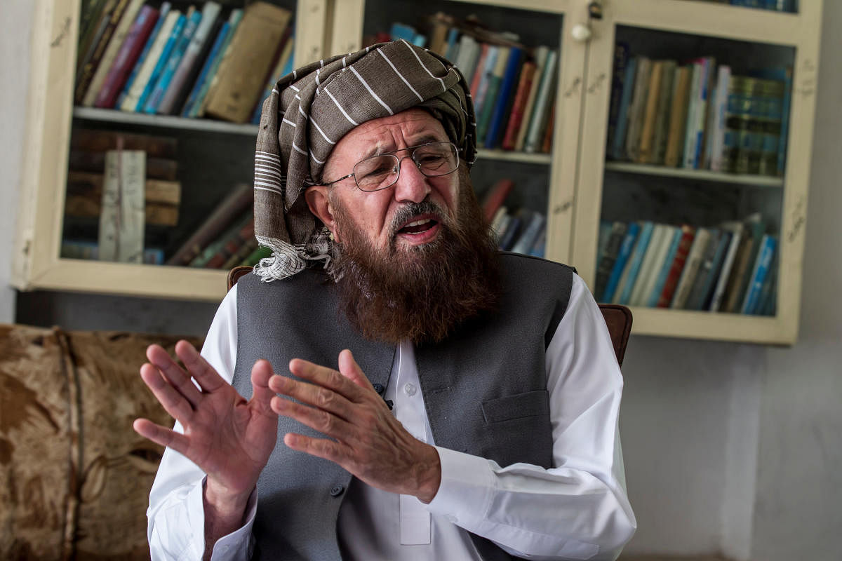 Maulana Sami-ul Haq, a Pakistani cleric and head of Darul Uloom Haqqania, an Islamic seminary and alma mater of several Taliban leaders, talks during an interview with Reuters at his house in Akora Khattak, Khyber Pakhtunkhwa province September 14, 2013.