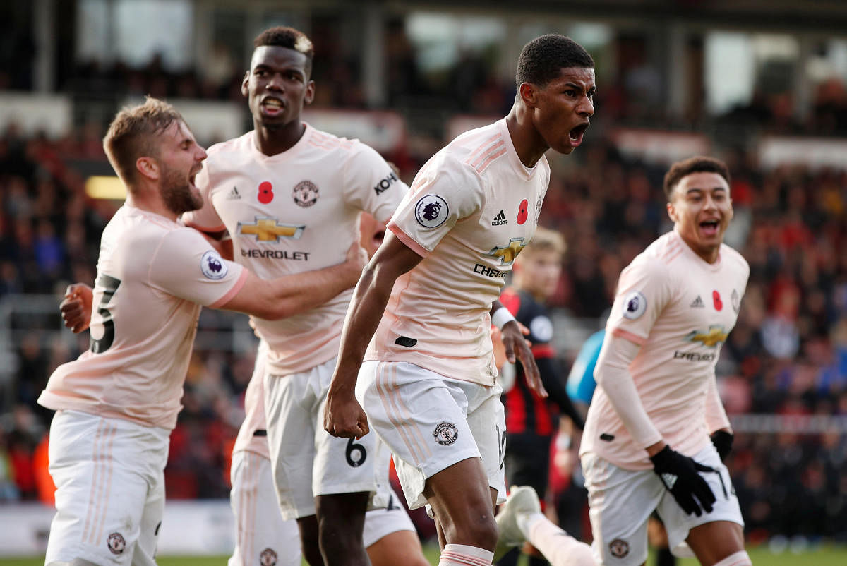 FINE FINISH: Manchester United's Marcus Rashford (second from right) celebrates after scoring the winner against Bournemouth on Saturday. Reuters