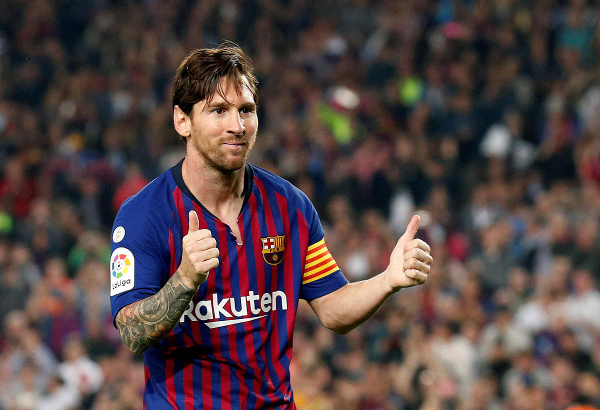 There's a good chance that Lionel Messi, who broke his arm last month, could make an earlier than expected return against Inter Milan on Tuesday. REUTERS 