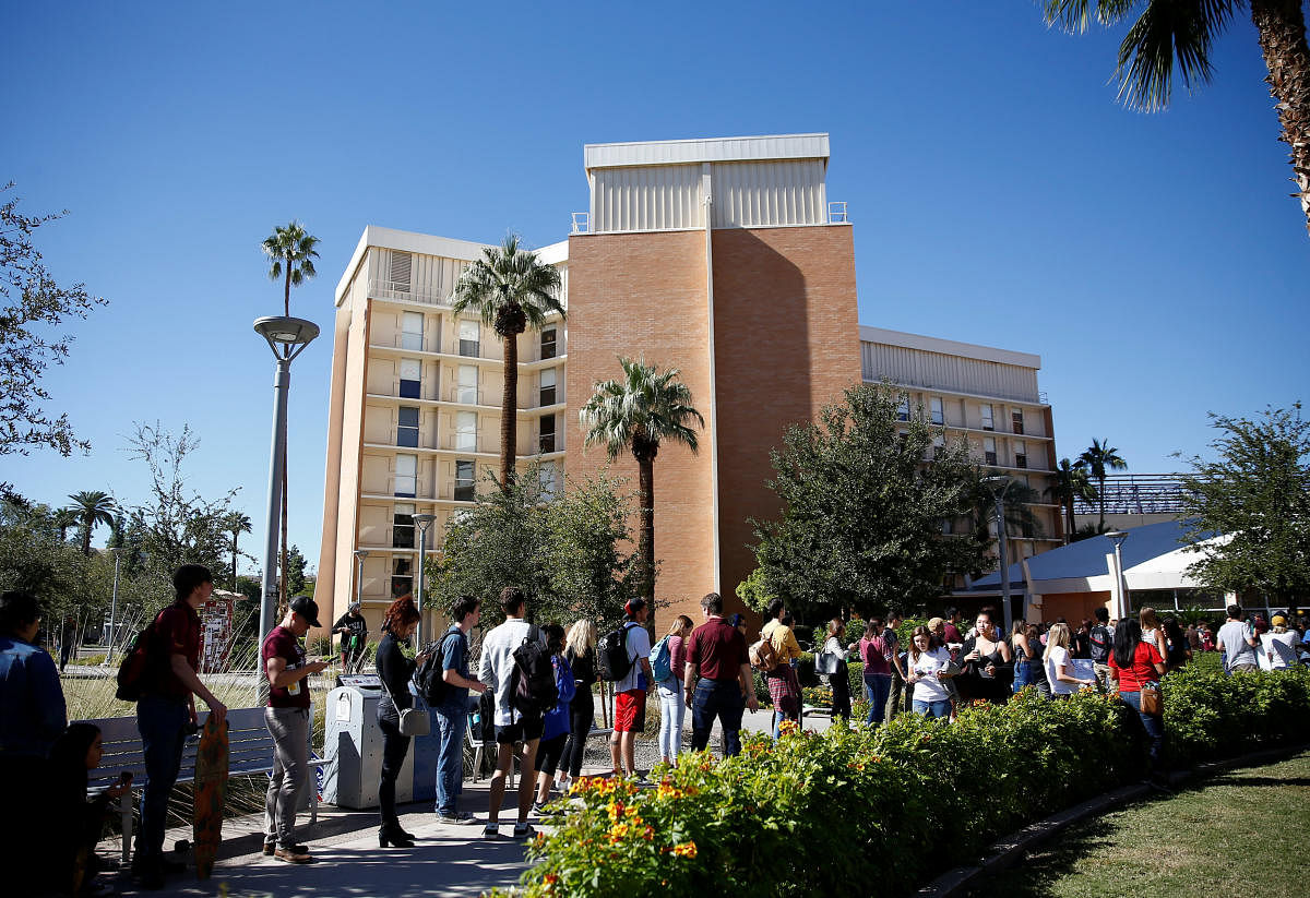 People line up to vote at the ASU Palo Verde West polling station during the U.S. midterm elections in Tempe, Arizona, US November 6, 2018. (REUTERS)