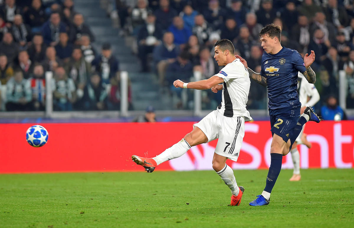 Juventus' Cristiano Ronaldo scores their first goal. Reuters photo 