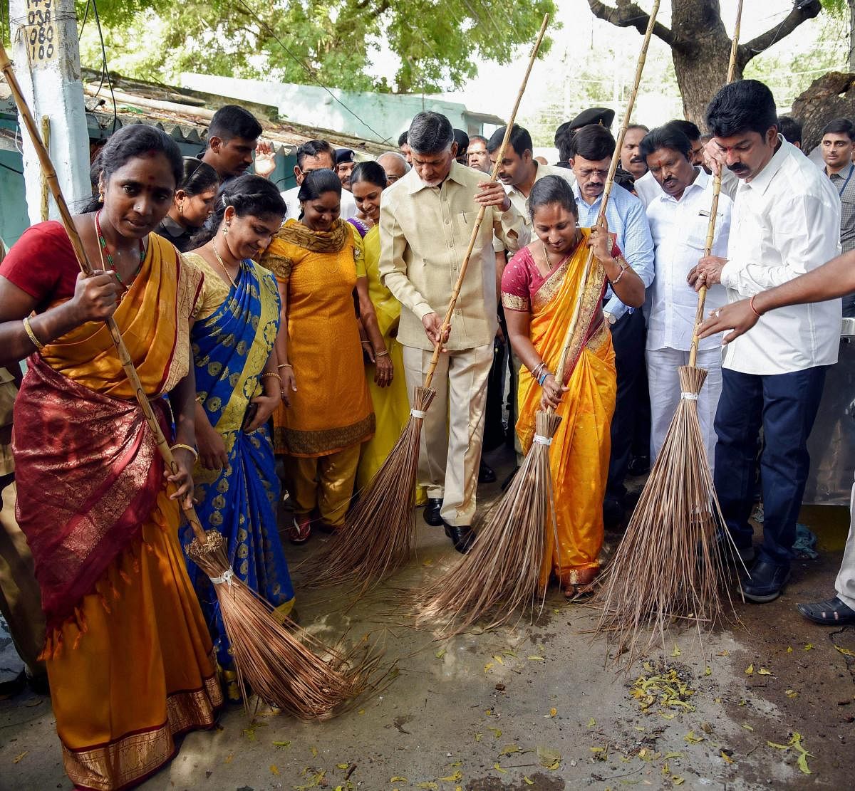 Andhra Pradesh Chief Minister Chandrababu Naidu participates in a cleanliness drive on the occasion of 'Gandhi Jayanti', in Vijayawada, on Tuesday. PTI