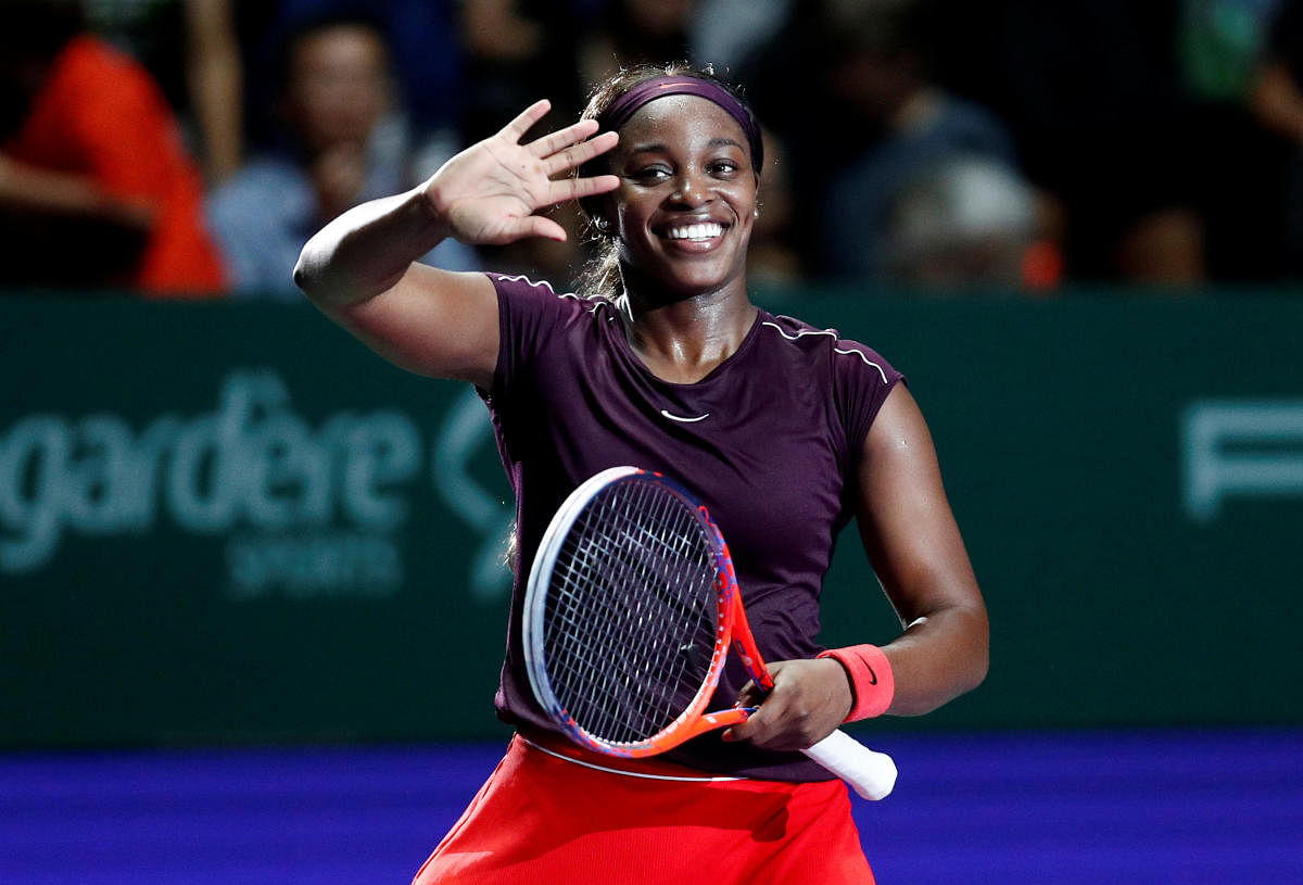 DELIGHTED Sloane Stephens of the US strikes a happy picture after beating Germany's Angelique Kerber to book her spot in the semifinals of the WTA Finals in Singapore on Friday. Reuters