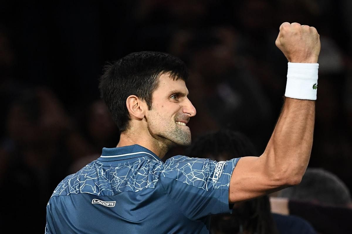 Serbia's Novak Djokovic celebrates after winning against Switzerland's Roger Federer. AFP