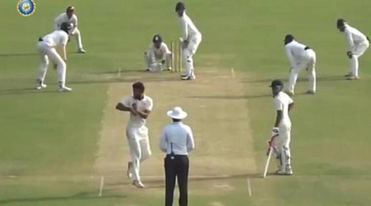 WHAT'S THIS? Uttar Pradesh's Shiva Singh does a 360-degree turn before delivering the ball. 