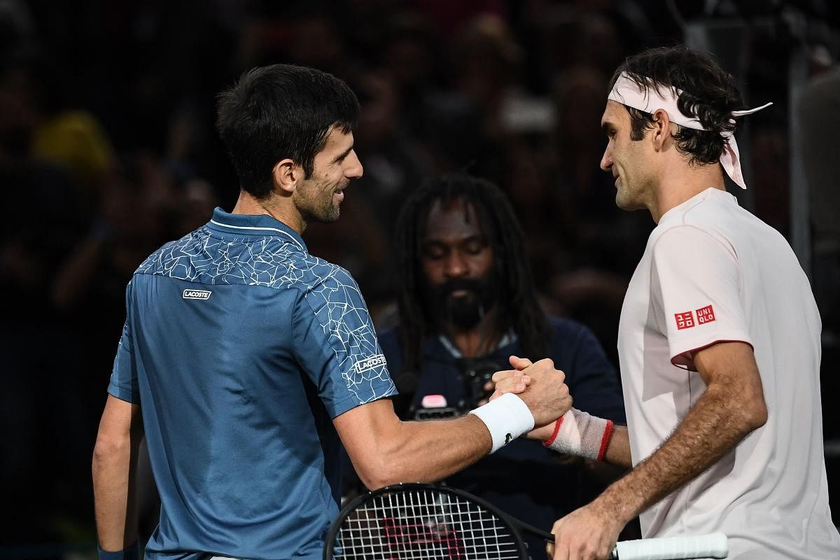 CLASH OF TITANS Novak Djokovic (left) and Roger Federer will be vying to end the season on a high. AFP