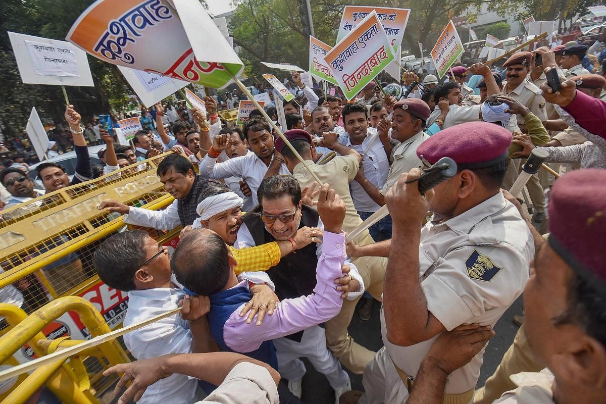Police detains Kushwaha Samaj supporters during a protest march against Nitish Kumar's government, in Patna, Saturday, Nov 10, 2018. (PTI Photo)