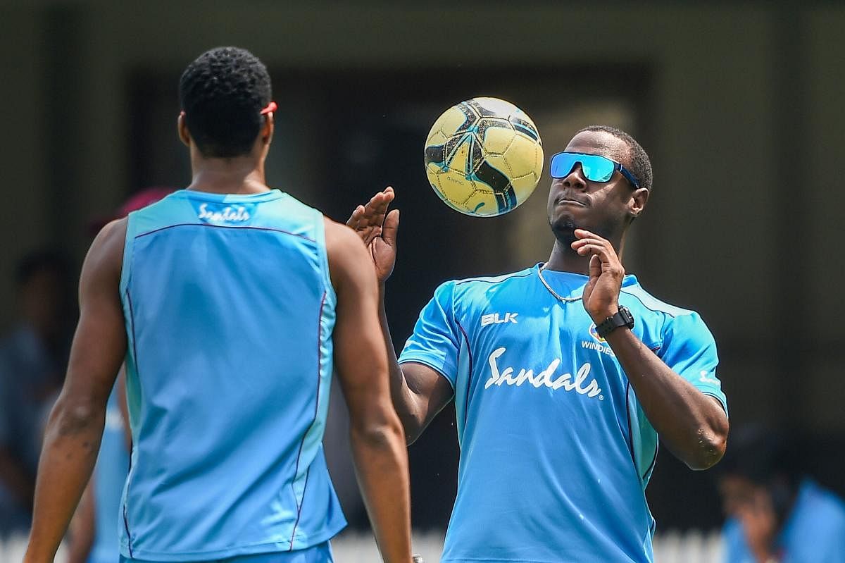 West Indies captain Carlos Brathwaite (right) during a practice session on the eve of the third T20I against India in Chennai. PTI