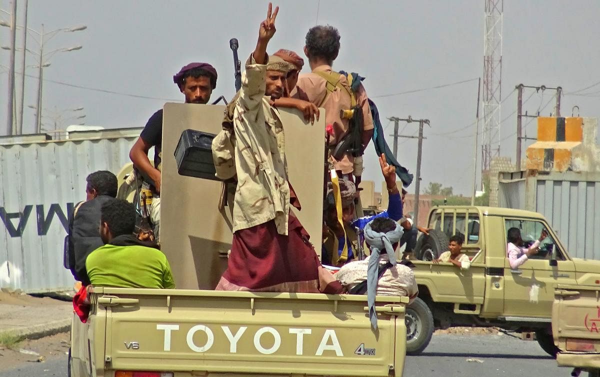 Yemeni pro-government forces gather on the eastern outskirts of Hodeida as they continue to battle for the control of the city from Huthi rebels. AFP file photo