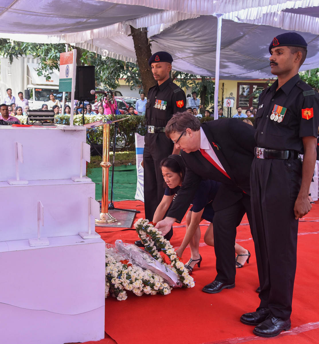 Dominic McAllister, British Deputy High Commissioner, lays wreath to the cenotaph at the Remembrance Day programme organised at St Mark's Cathedral on Sunday. DH Photo/S K Dinesh