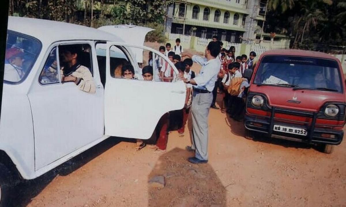 Children of Darul Islam Aided Higher Primary School board vehicles to reach their homes.
