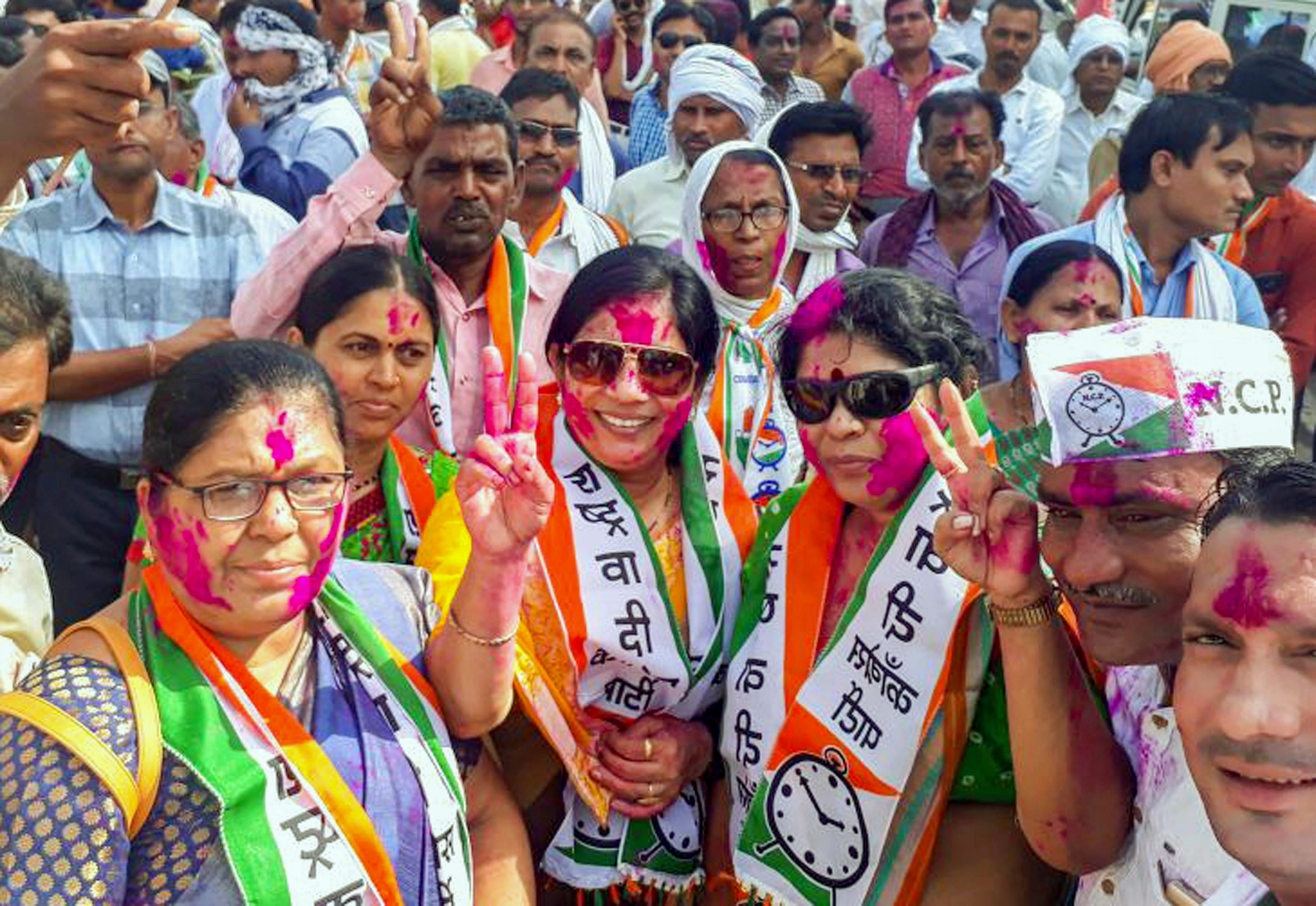 Nationalist Congress Party workers celebrate their party's success in Bhandara–Gondiya Loksabha byelections, outside their party office, in Bhandara district of Maharashtra on Thursday. PTI