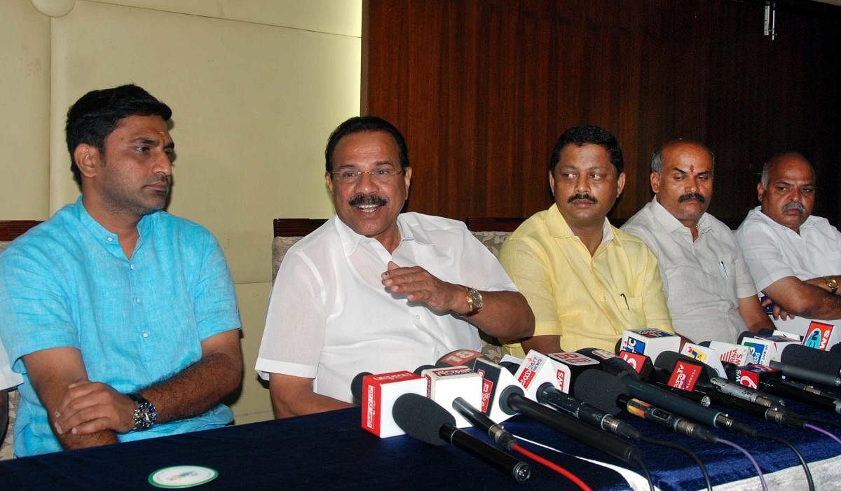 Union Minister D V Sadananda Gowda speaks about the programmes and the achievements of the Narendra Modi-led Union government in the last four years, in Hassan on Monday. MLA Preetham Gowda is seen.