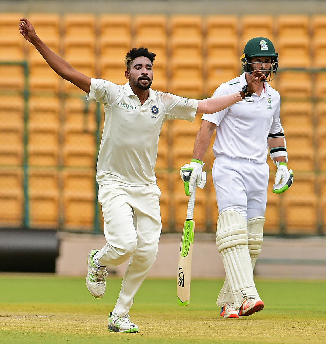 ON SONG Mohammad Siraj celebrates after sending back a South African batsman on the third day of their four-day game in Bengaluru on Monday. DH photo/ Ranju P