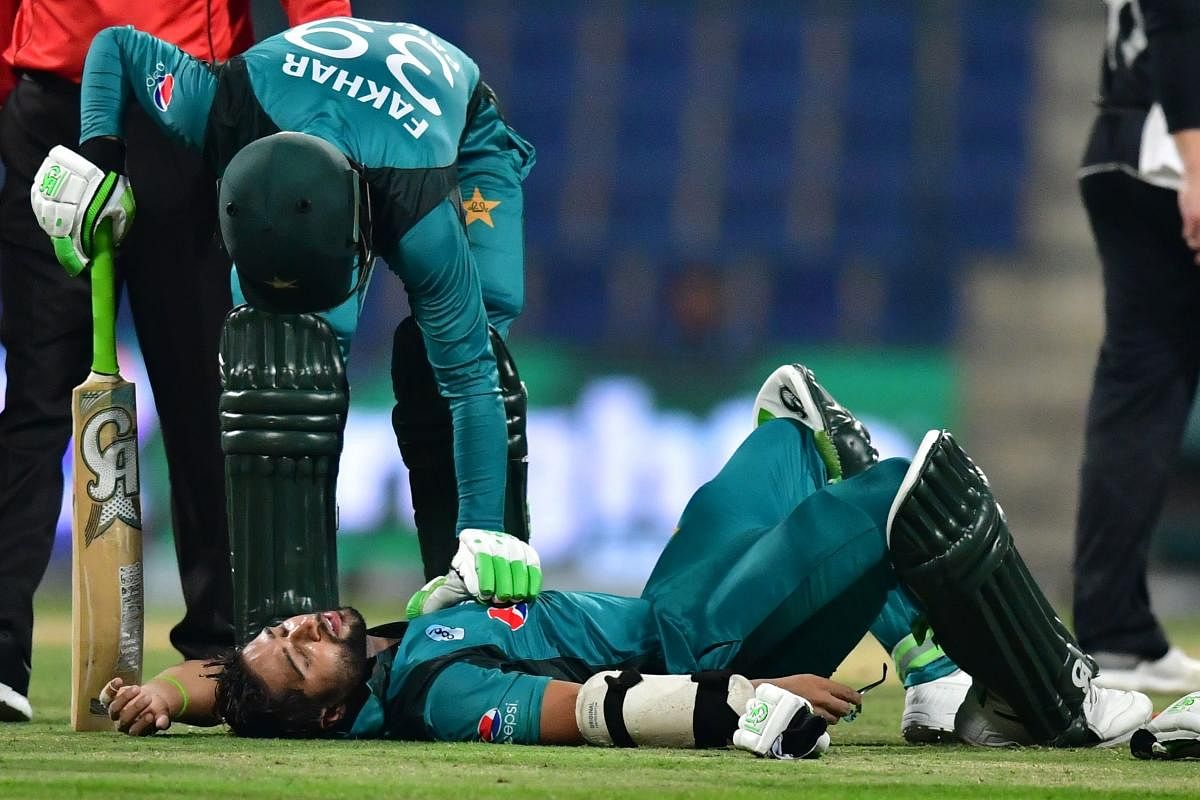 WORRYING SIGNS: Pakistan opener Imam Ul-Haq lies on the pitch after being hit by a short ball from New Zealand's  Lockie Ferguson during the second one day international. AFP