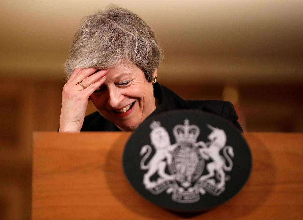 Britain's Prime Minister Theresa May reacts during a news conference at Downing Street in London, Britain November 15, 2018. (Matt Dunham/Pool via Reuters)