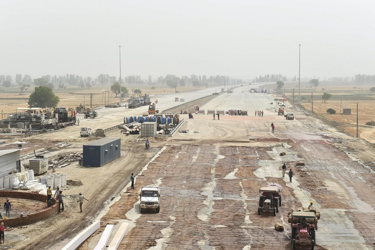 A view of the 135-km long Eastern Peripheral Expressway construction by the National Highways Authority of India to decongest Delhi traffic. PTI Photo 