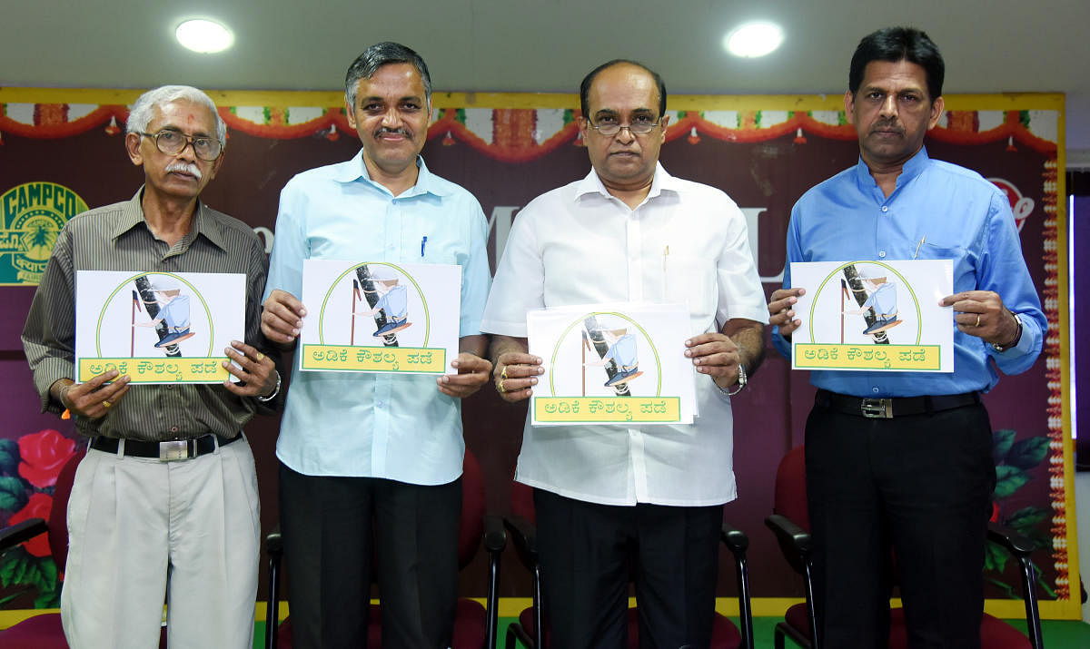 CAMPCO president S R Satishchandra (second from right) releases logo of the training programme for the first batch of unemployed youth at Varanashi towers on Friday.